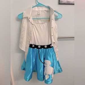 Weismann poodle skirt outfit for group figure skating performance. Worn once.